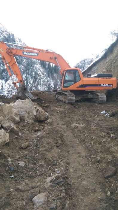 Экскаватор услуги