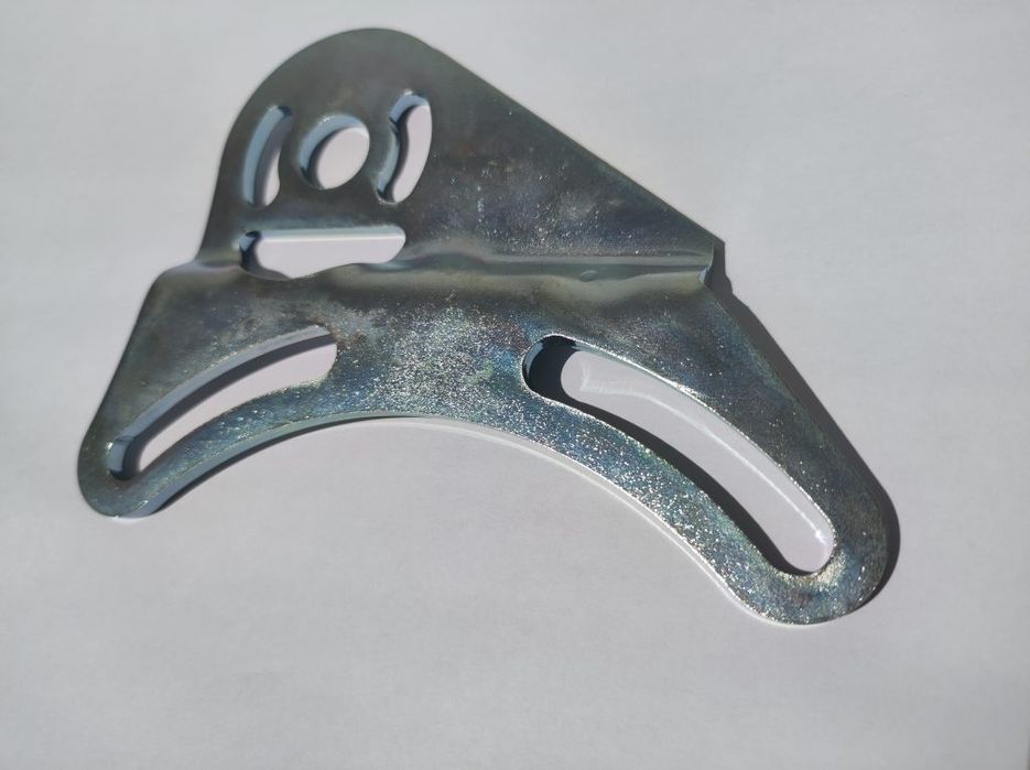 Регулируемата скоба за изпускателен клапан