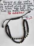 Bratara dubla cu bilute din aur si cristale negre, cu snur ajustabil.