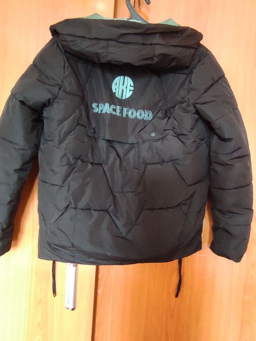 Женские фирменные куртки.