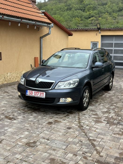 Vând Skoda Octavia.