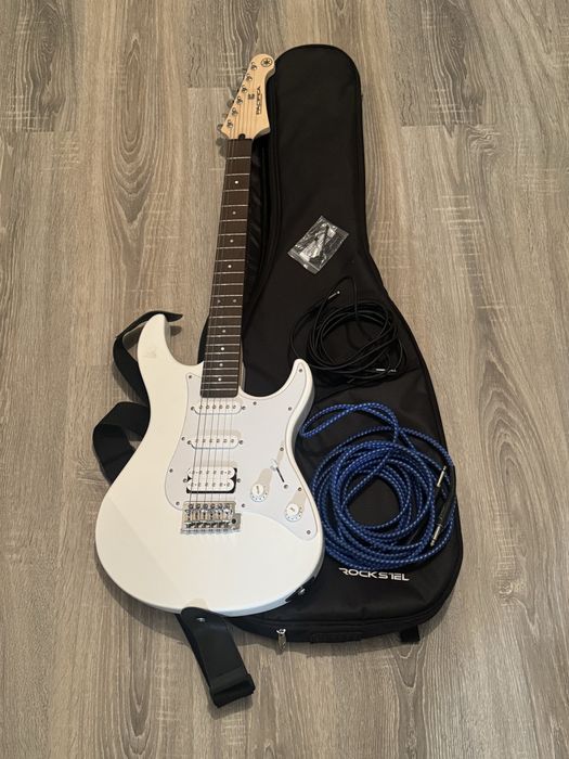 Продам электро гитару и комбик