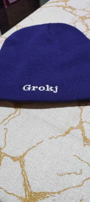 Caciula unisex, bleumarin de la Grokj. Fara urme de folosinta, ca noua