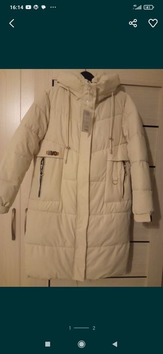 Зимний пуховик,новый с этикеткой