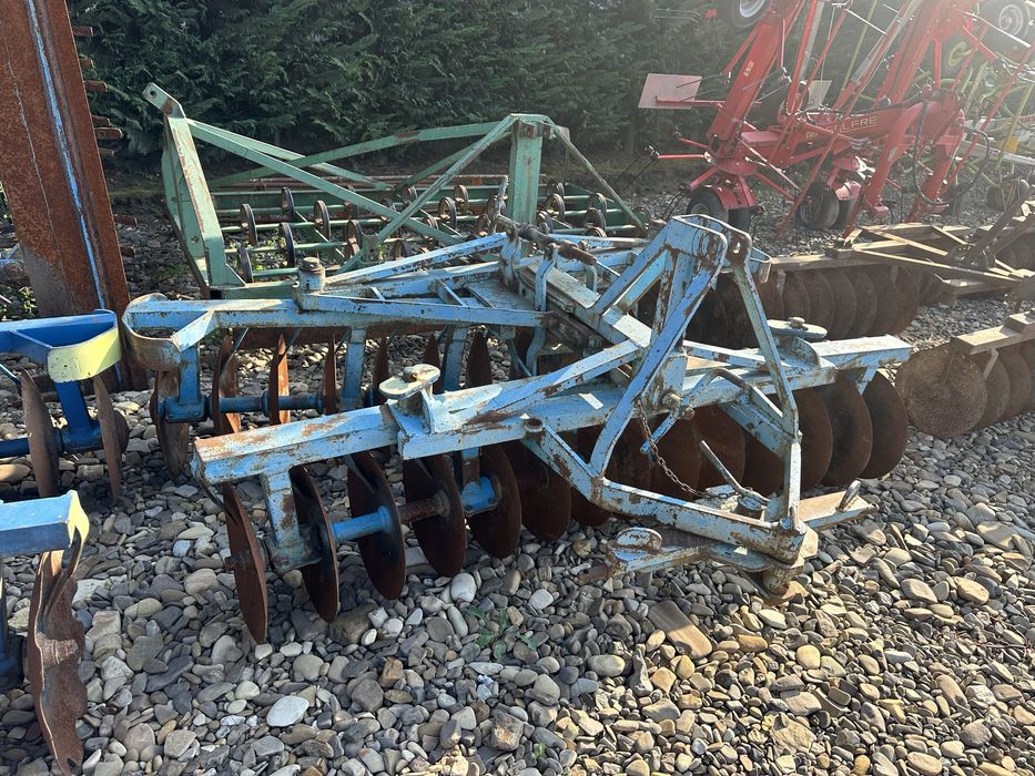 Disc agricol purtat pe tiranti