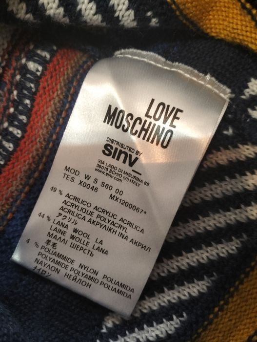 Bluză de corp Ortovox și rochie Moschino