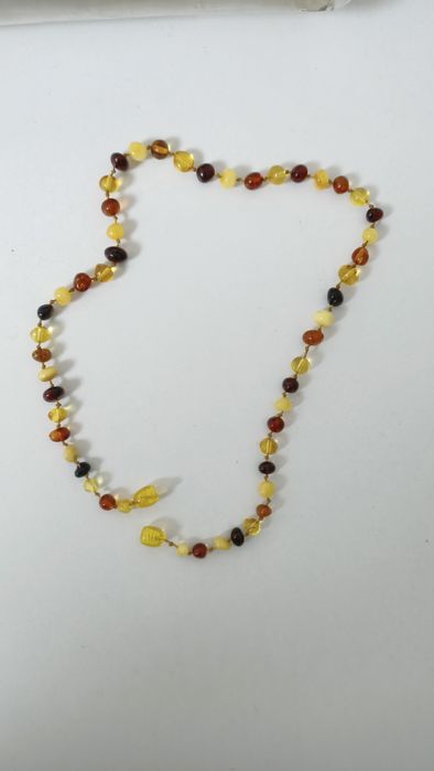 Продам детские янтарные бусы