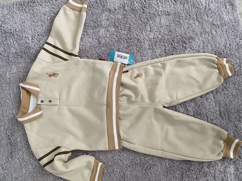 Теплые костюмчики новые по 2000