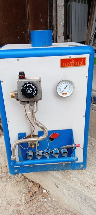 Отопительный газовый котел Юнилюкс на 200м2.На запчасти.