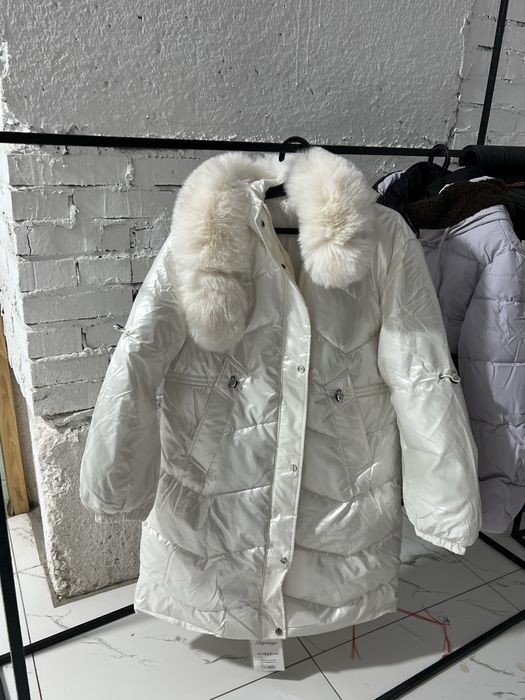 Куртки от 10.000 до 15.000
