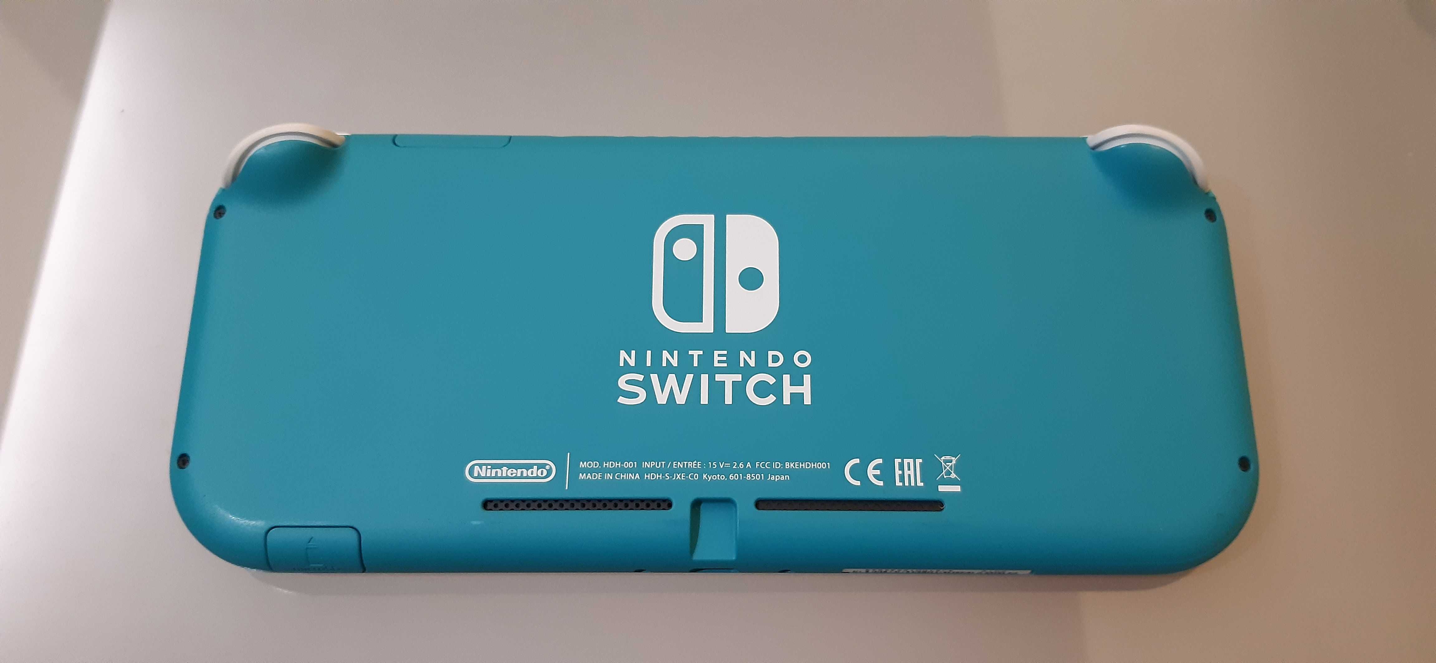 Nintendo switch lite + doua jocuri