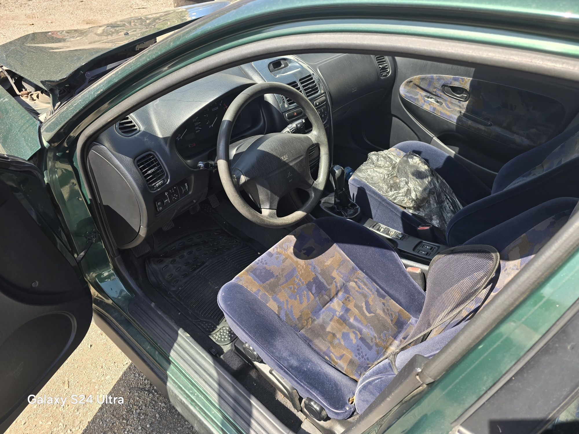 Mitsubishi Carisma GDI на части