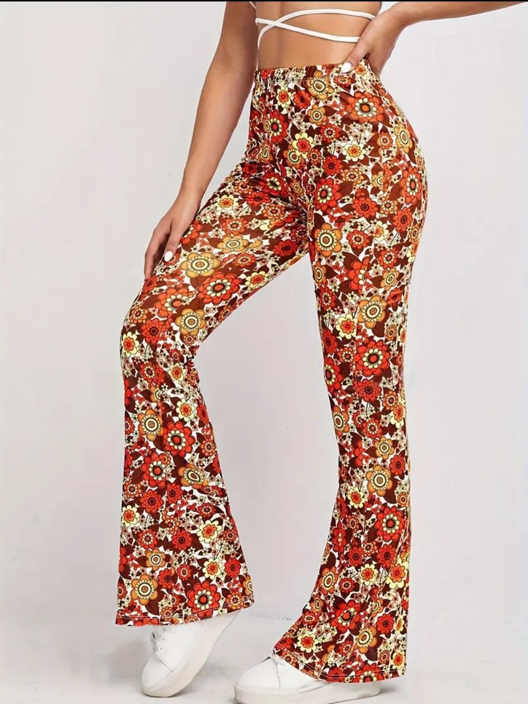 Pantaloni cu talie înaltă și imprimeu floral, model evazat