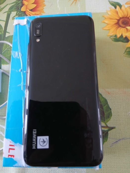 Мобилен телефон..