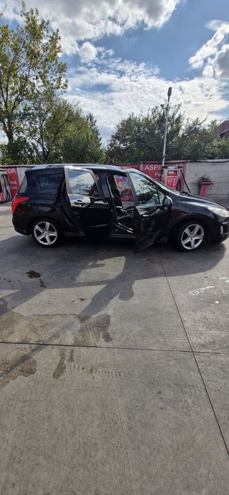 Peugeot 308 cu 7 locuri