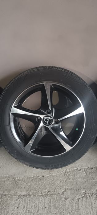 Jante în 4 prezoane aliaj 16 cu cauciuc Bridgestone