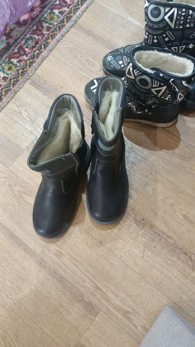 Продам новые сапоги