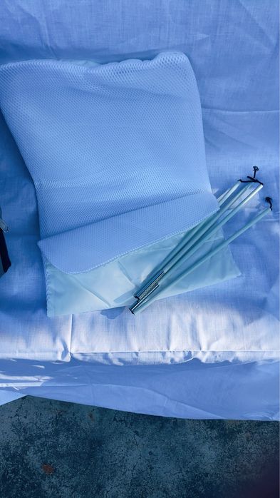 Раница с място за повиване на бебе