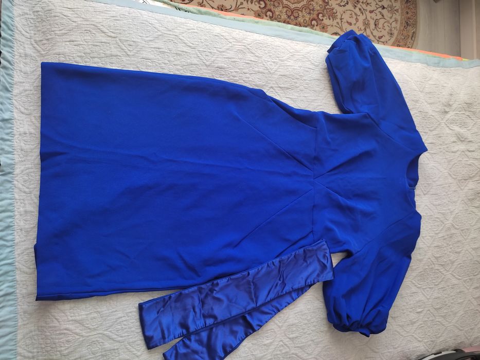 Продам платья размер 48 .  Район 1000 мелочей.