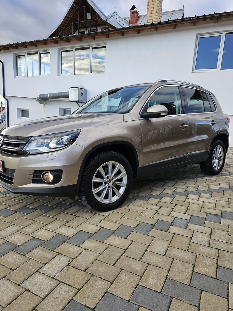 Tiguan model 2012(vand sau schimb)