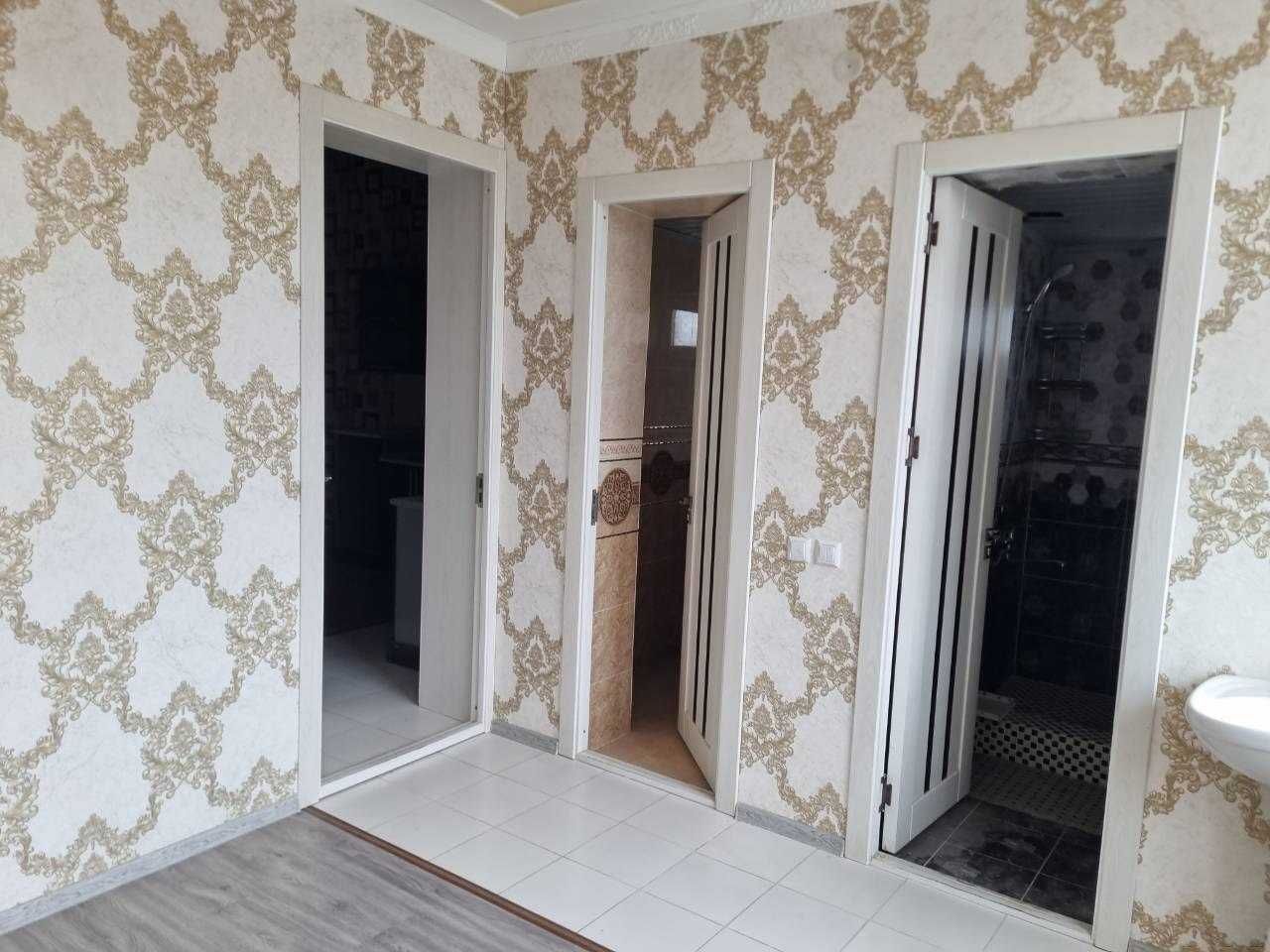 Ozbekiston tumanida Sun`iy qoplamali sport maydoni bino va inshootlari