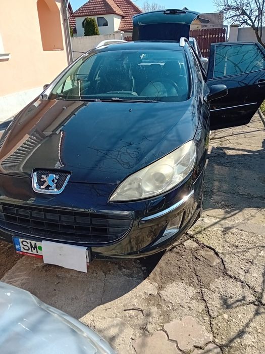 Vand peugeot 407..