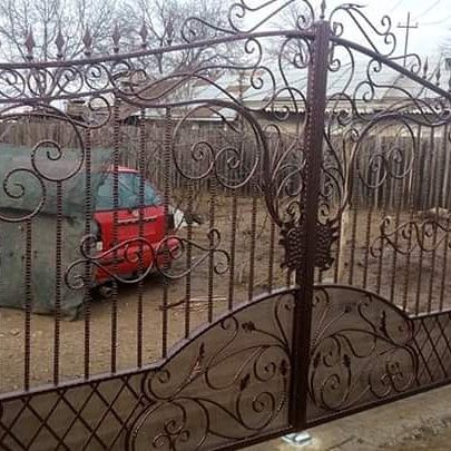 Porți,garduri,copertine ,scări din fier forjat