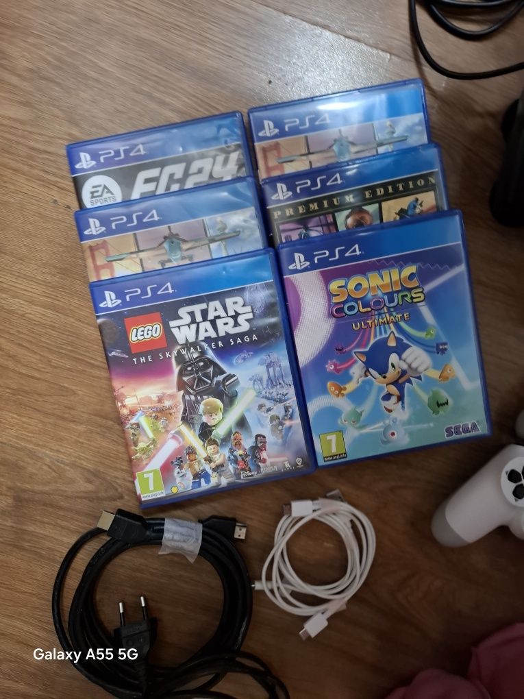 Vând PS4 pro de 1 TB cu volan si schimbator sau separat