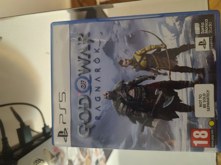 Playstation 5 disc edition cu God of war Ragnarok