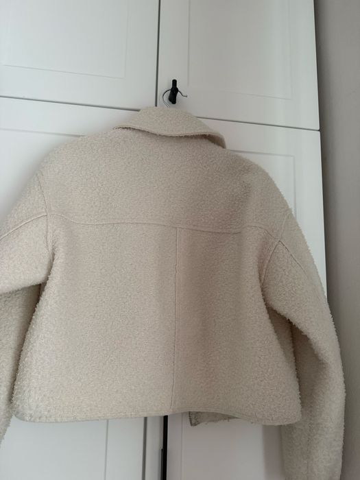 Букле саке с крепки джобове.