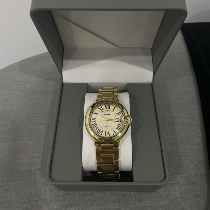 Часы Cartier золотистые