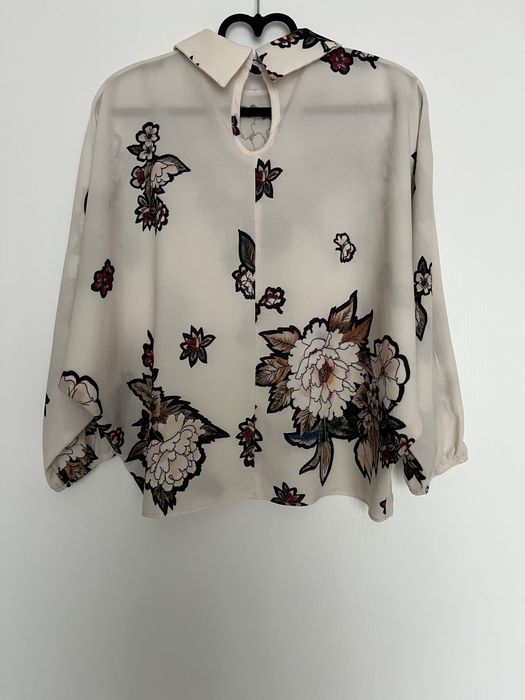 Bluza eleganta ivoar cu imprimeu floral