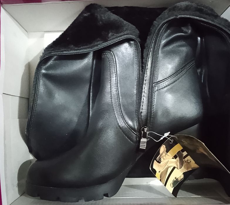 Жаңа етік сатылады