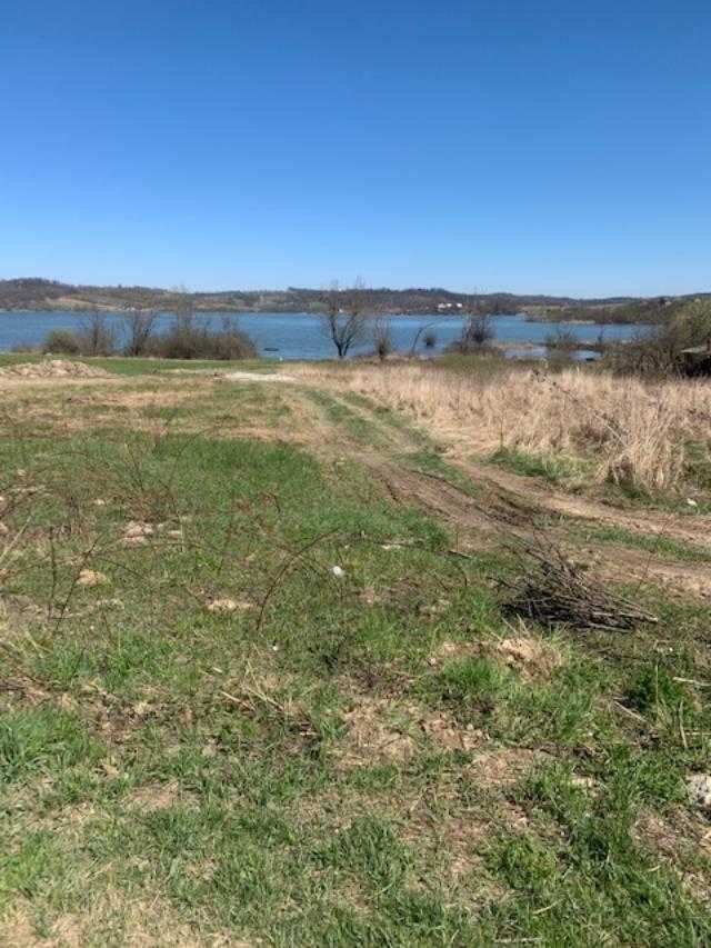 Vand teren intravilan , pe malul lacului Surduc , langa Fardea