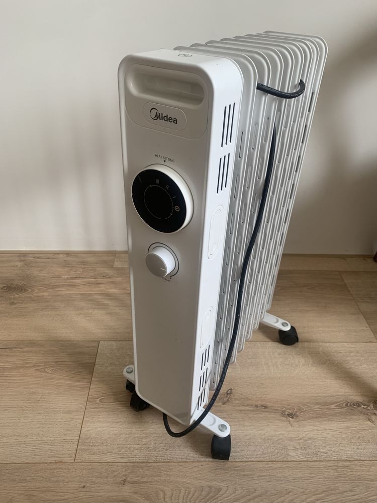 Масляной радиатор обогреватель Midea