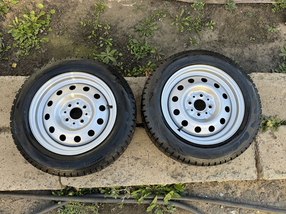 Продам два колеса диски с резиной 185/60 R14 состояие новых с шипами
