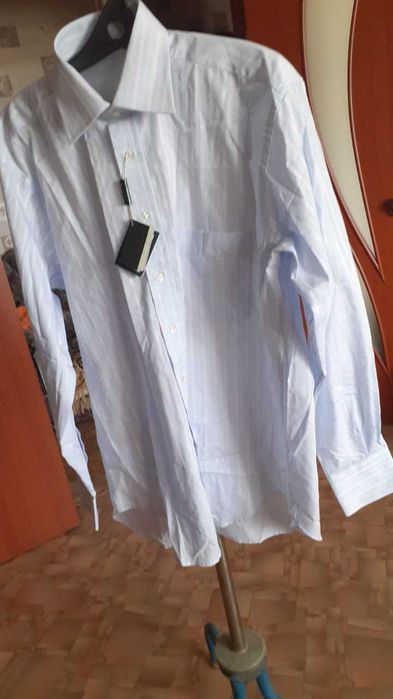 Продам рубашку новую