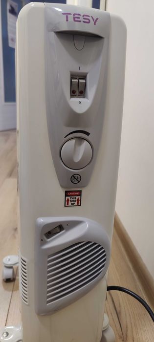 Продавам маслен радиатор с вентилатор  9 секции TESY CB 2009 E01 V