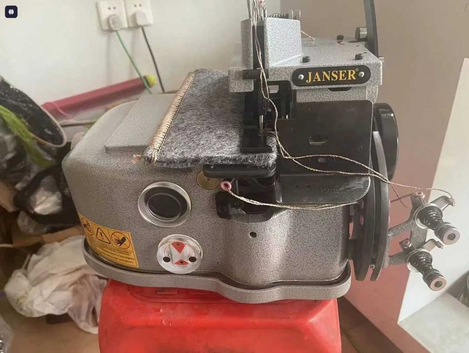 Janser overlok mashinka