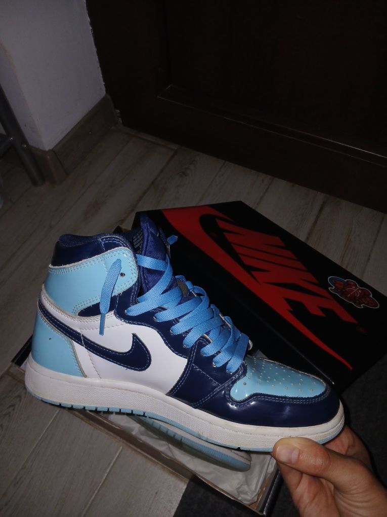 jordan 1 mid patent unc
