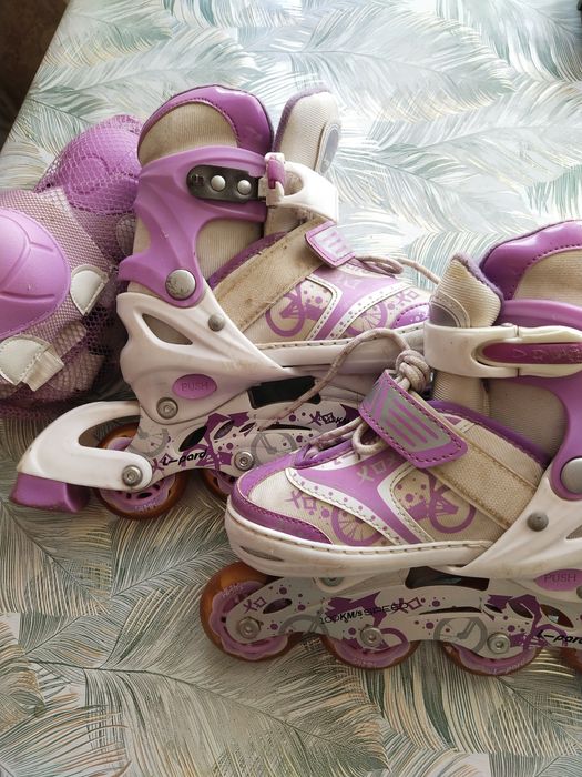 Роликовые коньки