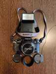 Camera foto clasica pe film SLR Canon A1 cu obiectiv 50mm f1.4 SSC