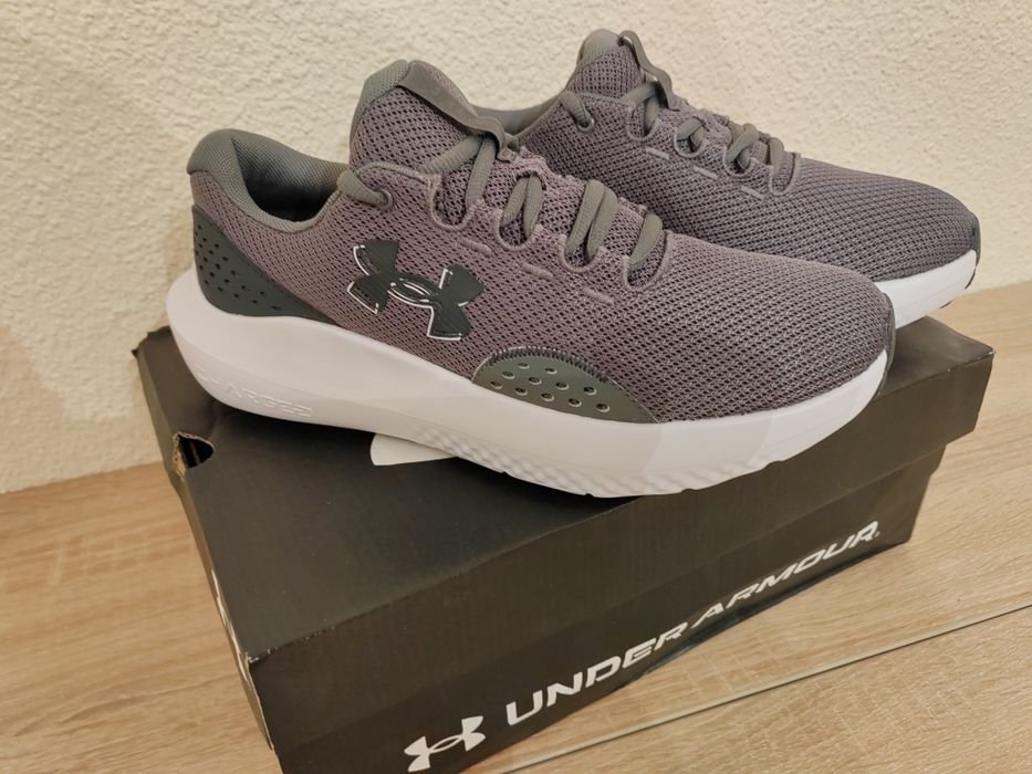 Under Armour model Charged Surge 4