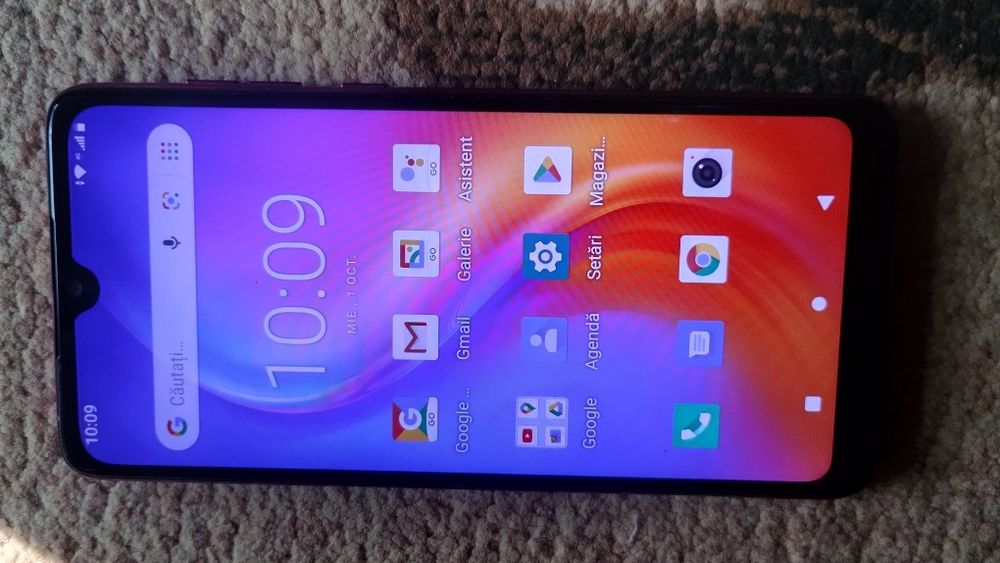 Telefon mobil puțin folosit