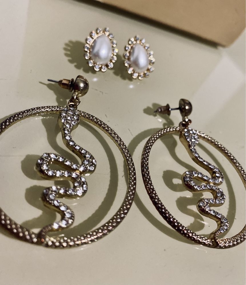 2 Earrings for sale