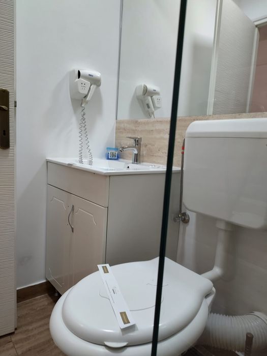 Garsoniere central regim hotelier