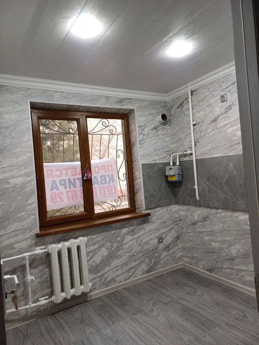 Продается  2-х комнатная квартира  с евроремонтом  на 1 этаже в центре