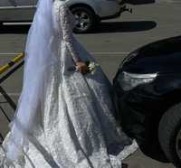 Прокат люксового свадебного платья с фатой