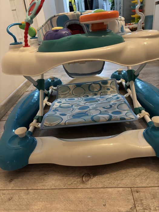 Premergator cu balansoar Coccolle Inizio albastru