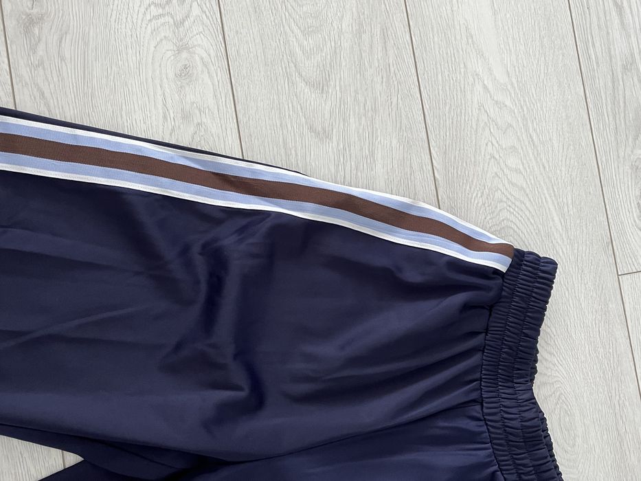 Pantaloni evazati cu fermoar